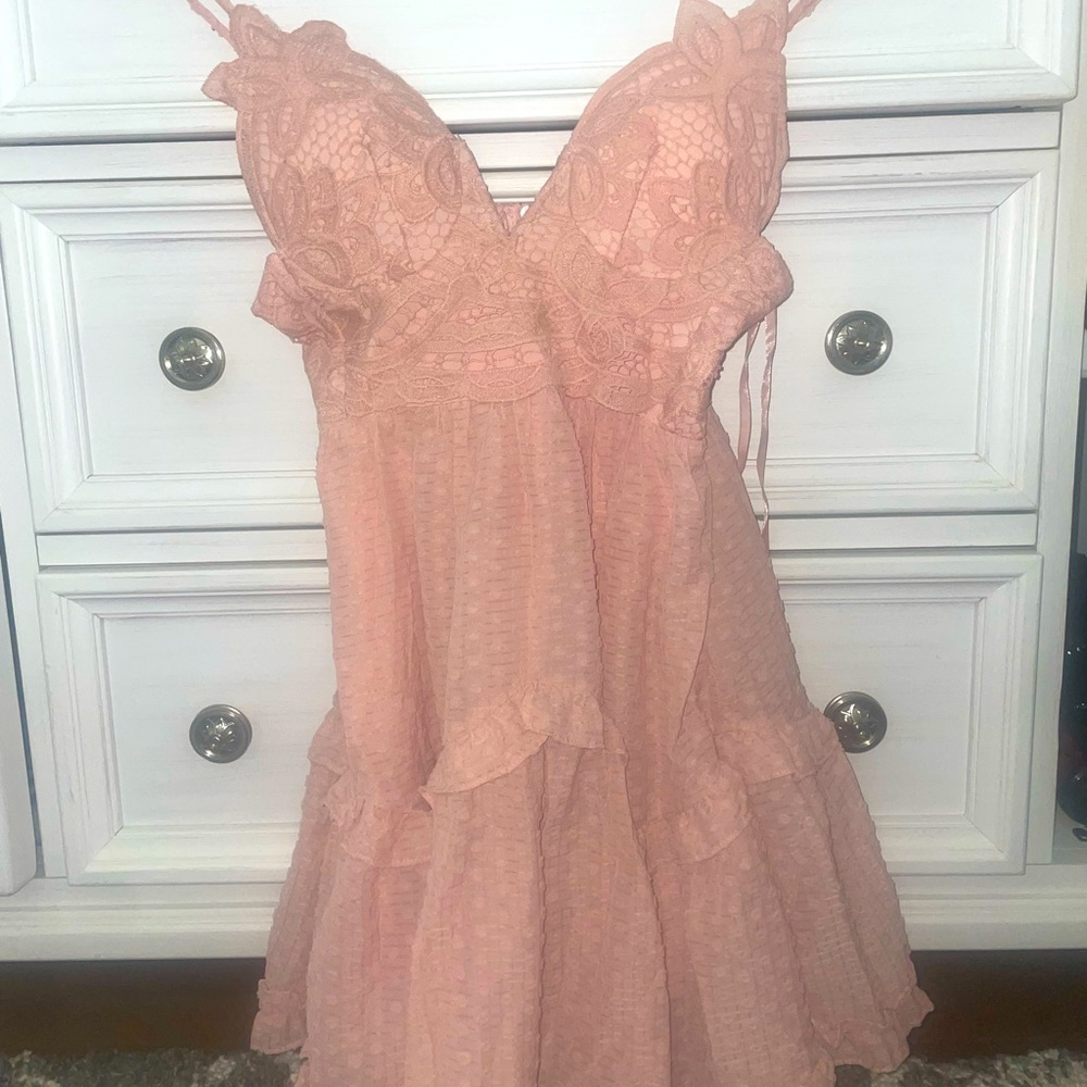 Light pink skater dress with lace detail